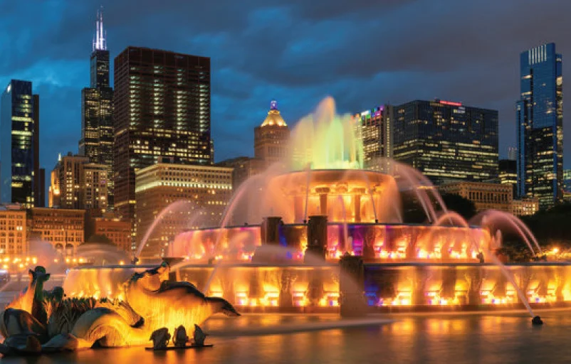 Night view of Chicago City skyline with skyscrapers and Buckingham fountain, Chicago, Illinois